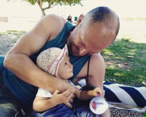 dad looking at toddler 