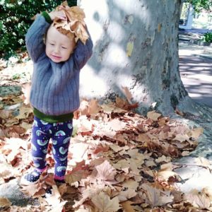 toddler playing in nature
